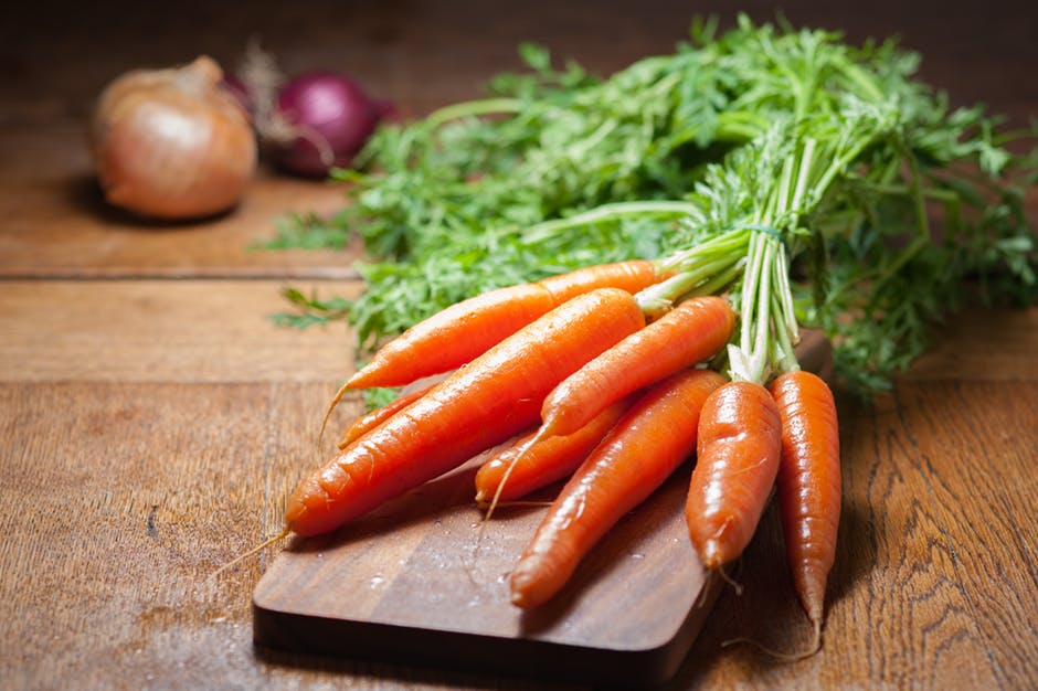 Fresh carrots on a cutting board
